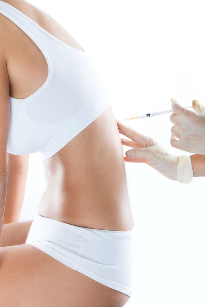 Surgeon Making Injection into Female Body. Neural Therapy Concep